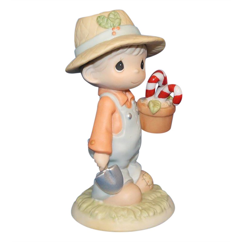 Precious Moments: 730130 Raisin' Cane on the Holidays